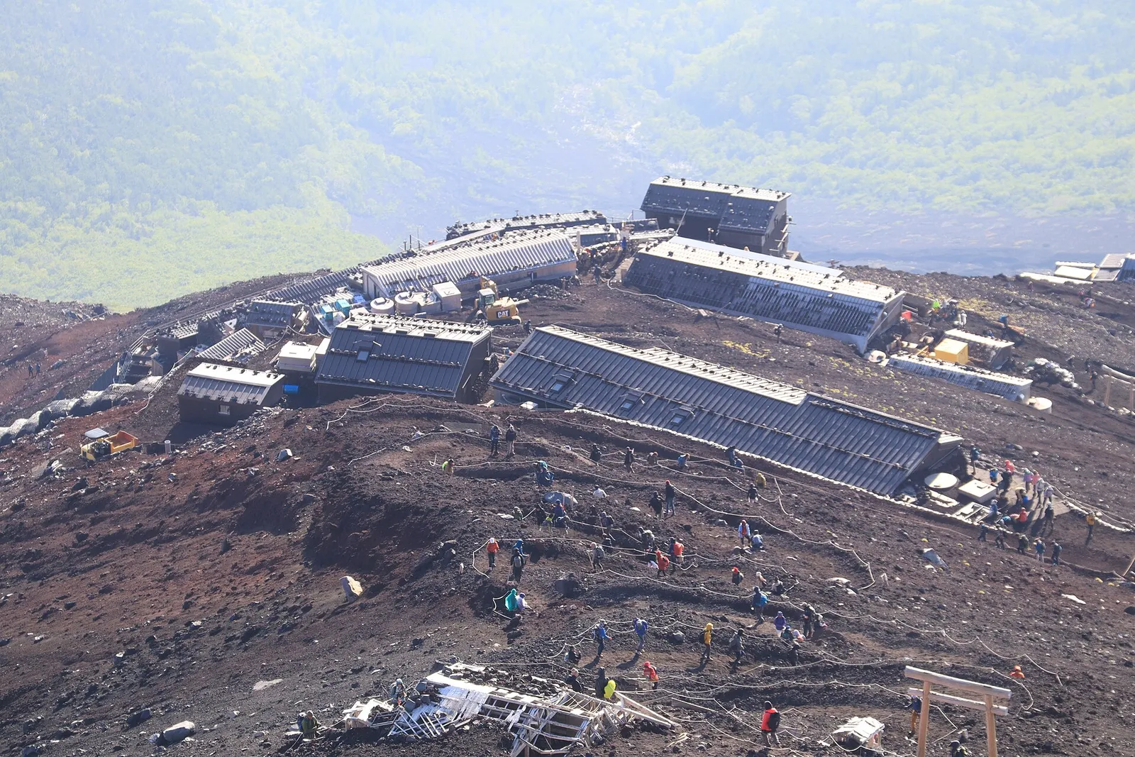 Climbers and mountain huts along the Yoshida route on Mount Fuji during the official summer season
