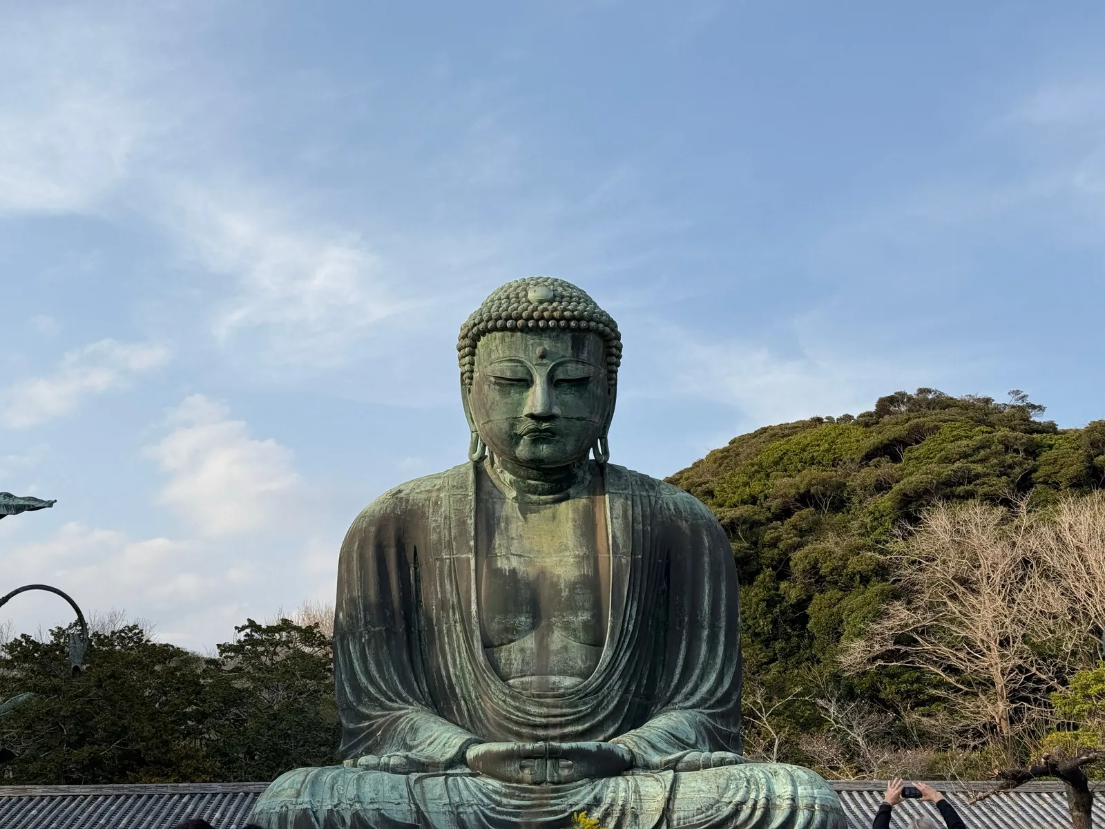 The bronze Great Buddha of Kamakura seated in the open air