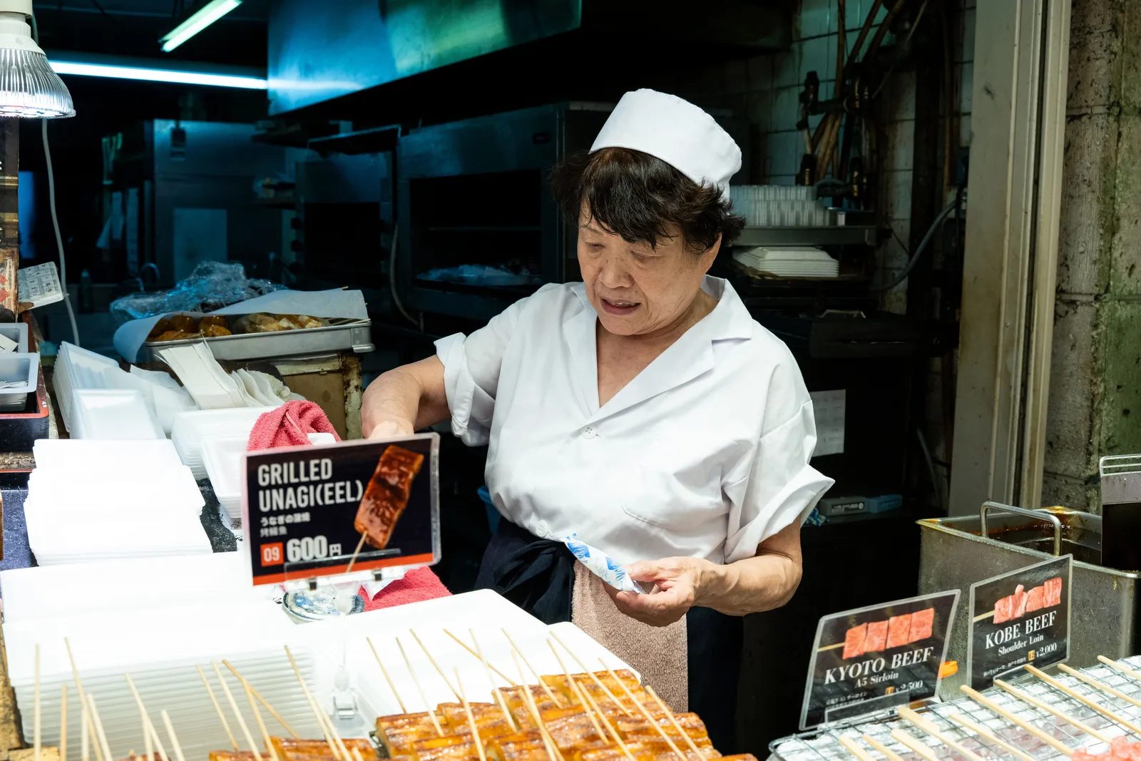 Stalls of pickles, skewers and local specialities along Nishiki Market in Kyoto