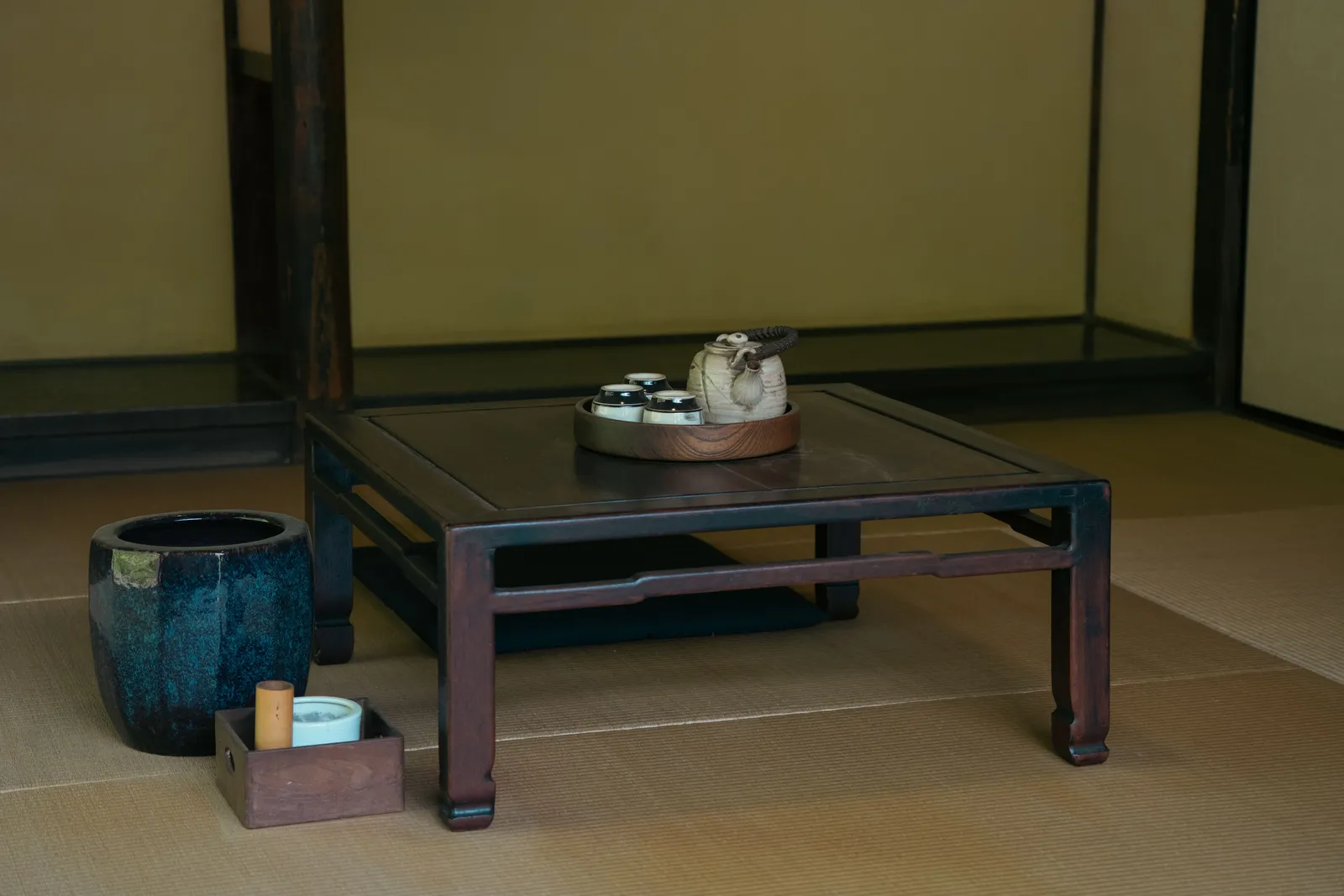 A small tea service laid out on a low table in a tatami temple guest room, Koyasan, Japan