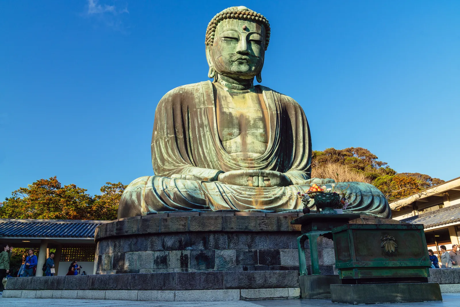 The great bronze Buddha statue seated in the open air at Kamakura, Japan